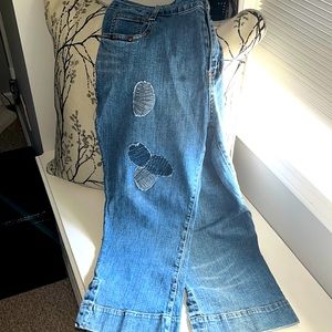 Parallel blue Jean capris with patchwork design